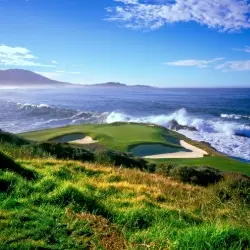 Waves crashing on the rocks by the 7th hole at Pebble Beach Golf Club