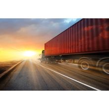 Semi Truck Driving Into Sunset Wall Mural