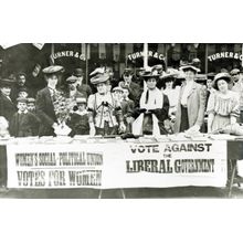 Suffragettes at a campaign stand Wall Mural