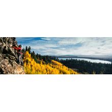 Climber Scaling Granite Cliff Wall Mural