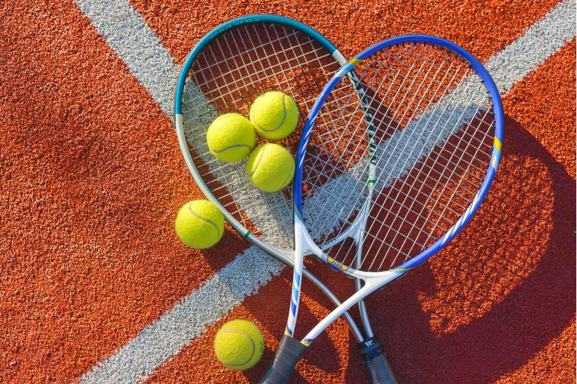 Sticker Tennis ball on a tennis clay court