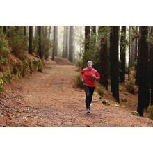 Man Running in Forest Wall Mural
