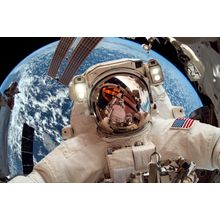 Astronaut Over Earth Wall Mural