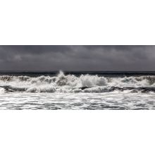 A Stormy Sky Moves Ashore Wall Mural