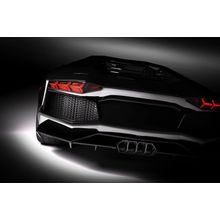 Black Sports Car In Spotlight Wall Mural