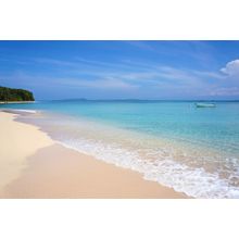 Beautiful Tropical Beach With Clear Water And A Boat Alone In The Caribbean Sea Wall Mural