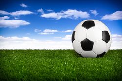 Soccer-Ball-On-Green-Field-Mural-Wallpaper