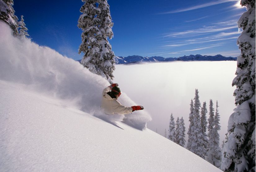 Snowboarding-Above-The-Clouds-Wallpaper-Mural