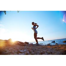 Woman Running On The Beach Wall Mural