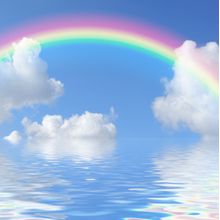 Blue Sky And Rainbow Over Water Wall Mural