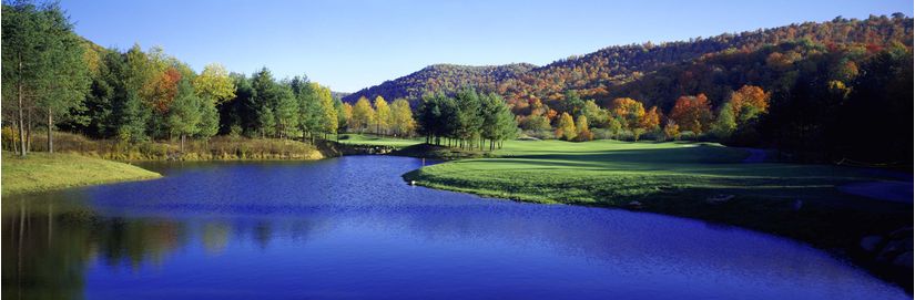 View-of-Raven-Golf-Club-with-a-stunning-green-fairway-a-crystal-lake-and-outstanding-trees