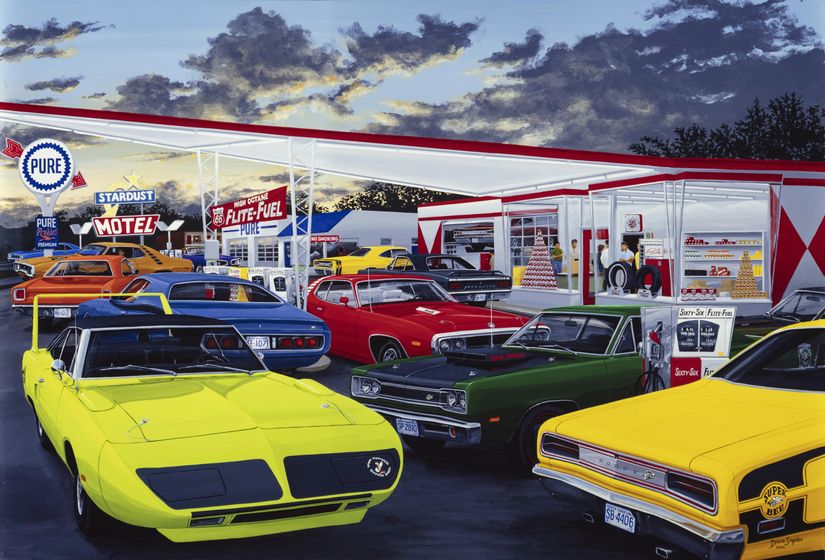 Classic-Phillips-66-gas-station-with-an-assortment-of-muscle-cars-gathered-in-the-lot
