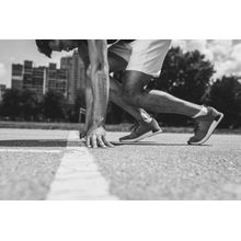Male Sprinter In Starting Position Wall Mural