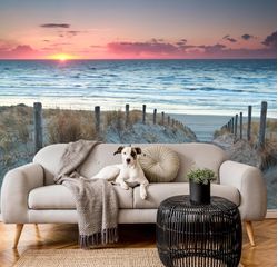 Sunset-beach-mural-behind-a-couch