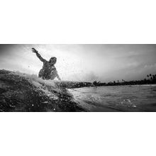 Young Surfer Riding Wave At Sunset Wall Mural