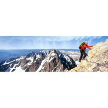 Male Climber Challenging Exum Ridge With Snowcapped Peaks Wall Mural