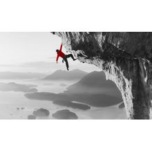 Rock Climbing A Mountain With Pop Of Red Wall Mural