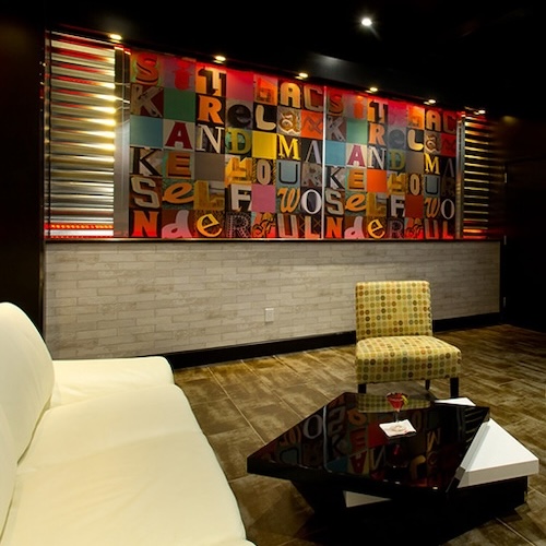 Colorful word cloud mural in a lobby