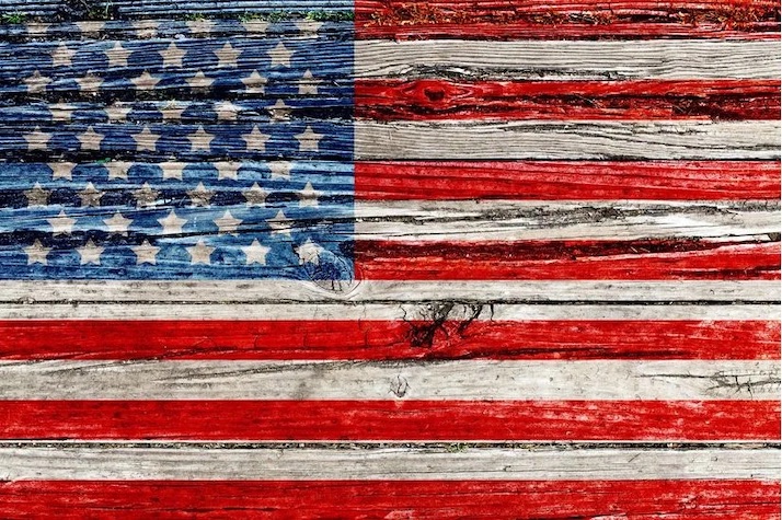 American flag painted on old wooden panels