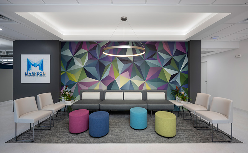 Colorful Triangle Geometric Wallpaper Mural in medical office reception area