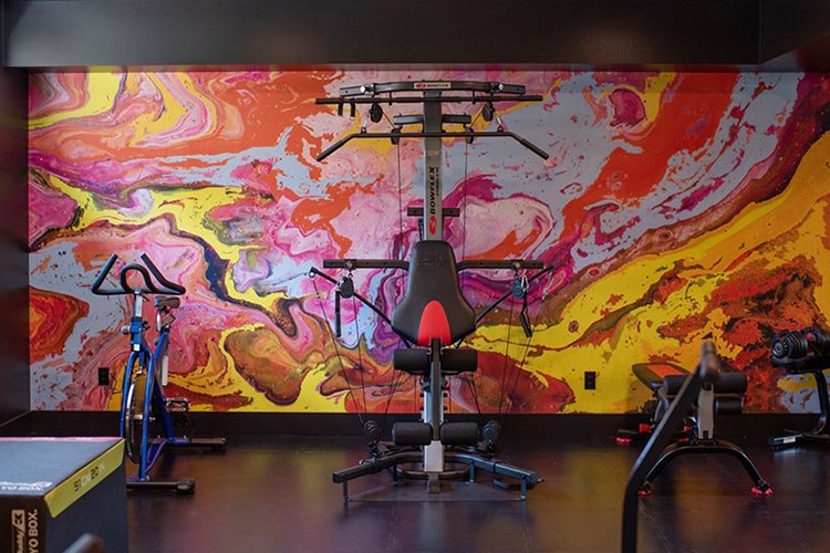 Colorful abstract mural in a hotel fitness area