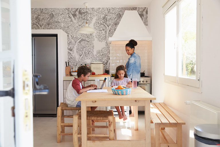 forest pattern mural in a kitchen