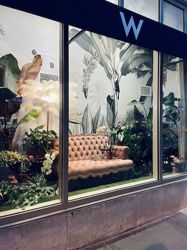 Tropical wallpaper as the backdrop for a window display