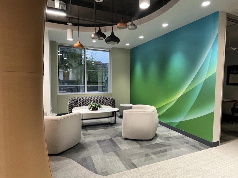 Custom geometric mural in an office space