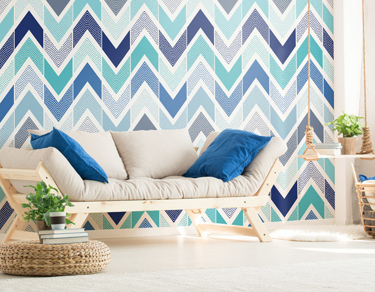 blue pattern wall mural in a living room
