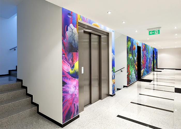 Coral reef sea life wall mural in elevator hallway