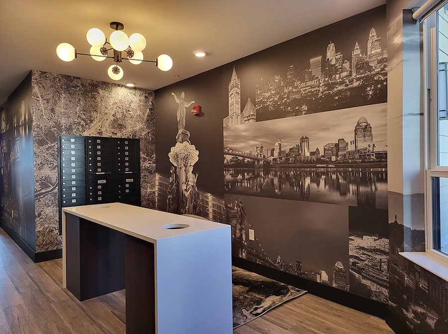 Mail room with black and white local landmark photo collage wall mural