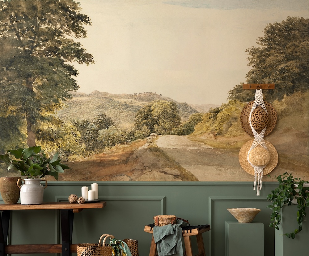 Vintage landscape mural with trees and road in the hills in an hallway