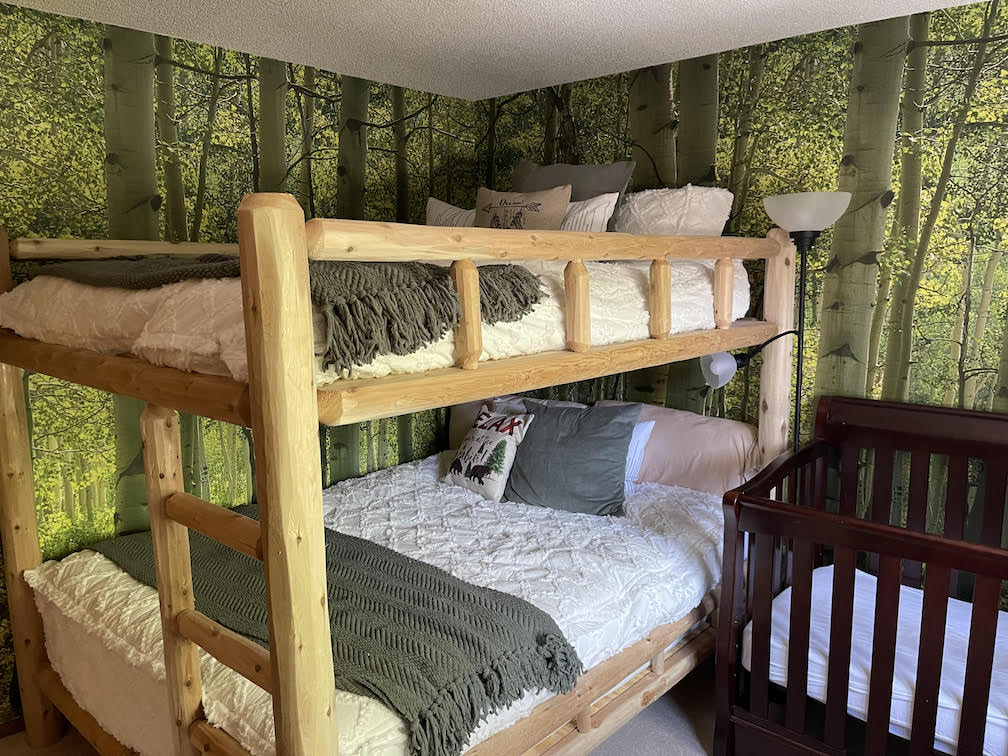 Green Hued Aspen Forest Mural In Guest Bedroom
