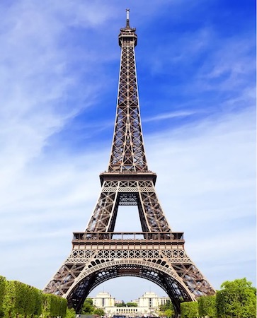 View of the iconic Eiffle tower near the base looking up