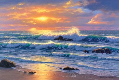Waves Crashing On A Sunset Lit Beach