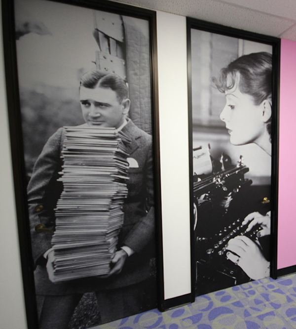 Black and white vintage portraits door murals of man with books and woman at typewriter