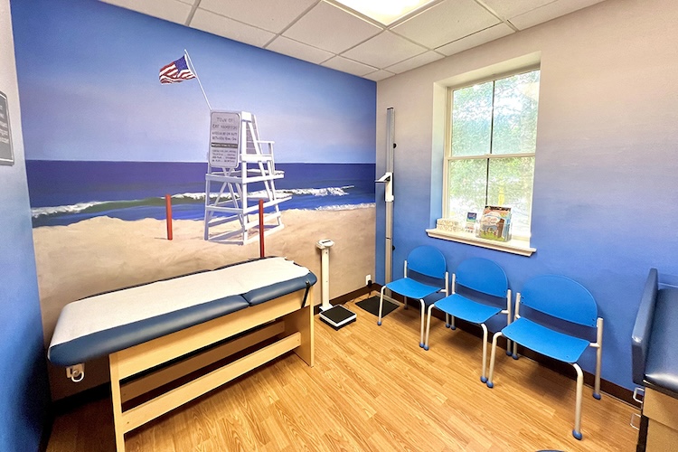 Beach lifeguard stand painting wall mural in pediatric medical room