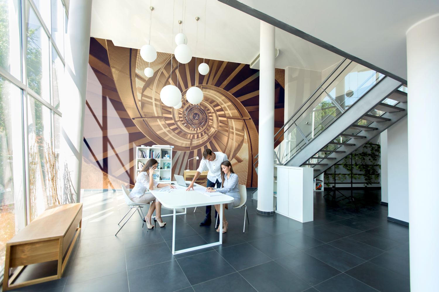 Mousse colored spiral stairway mural in an office space