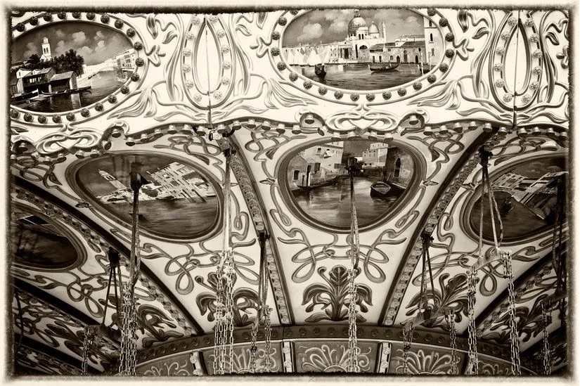 Close up view of a vintage carousel ceiling