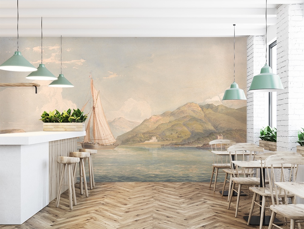 Vintage waterscape mural with a sailing boat and mountains in a cae