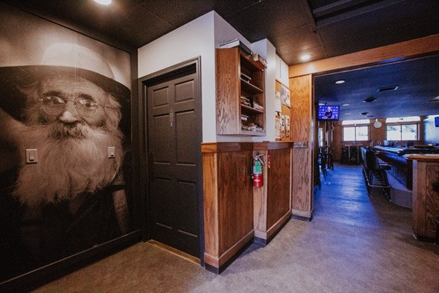 Photo Of Old Man Wall Mural In Bar