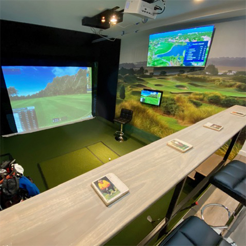 Golf mural in a golf simulator room at a hotel